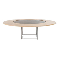 Round wooden dining table with light natural finish and a contrasting dark gray stone center. Sleek metal base.