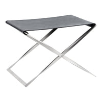 Black leather folding stool with sleek stainless steel frame, minimalistic design and modern aesthetics.