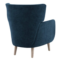 "Back view of a soft, dark blue upholstered chair with light wooden legs, featuring a smooth, solid color design."