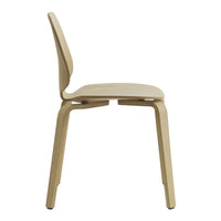 Light beige wooden chair with a smooth, curved design and no visible patterns, perfect for modern decor.