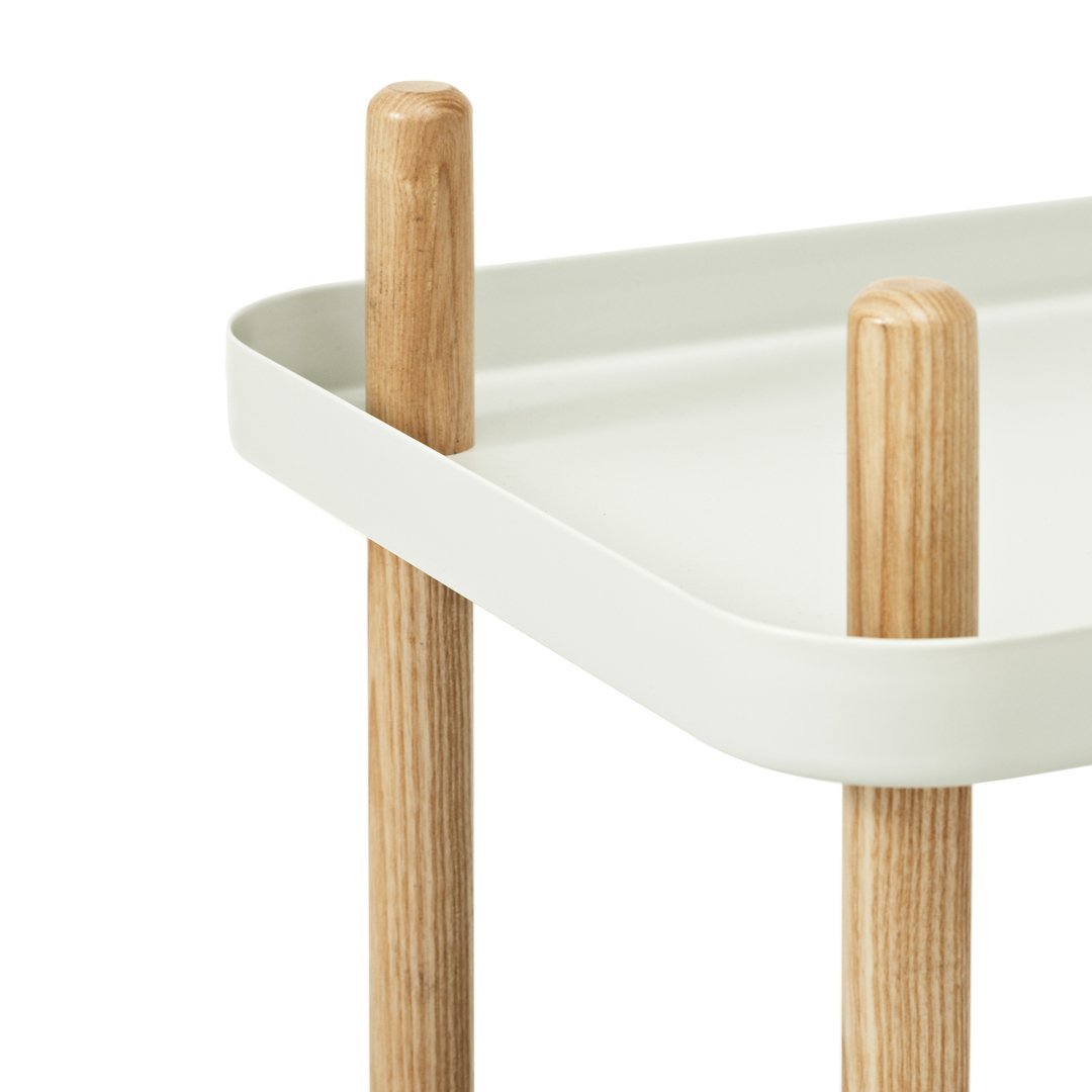 Minimalist white tray with natural wood legs, showcasing a clean, modern design and understated elegance.