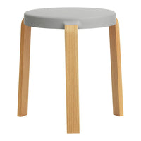 Light gray circular seat with natural wood legs. Simple, modern design suitable for various decor styles.