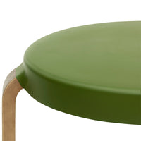 Round green table surface with smooth finish and natural wood legs, creating a modern and stylish appearance.