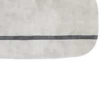 Light gray rug with a smooth texture and a contrasting dark gray line pattern. Perfect for modern decor.