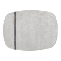 Gray rectangular rug with a subtle textured pattern and a single dark stripe for accent. 