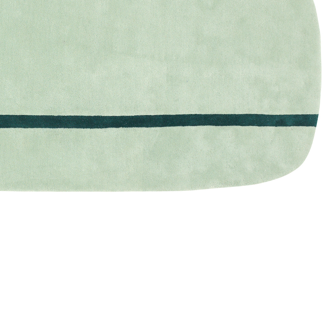 Soft mint green surface with a dark green stripe pattern. Ideal for a calming aesthetic in home decor.