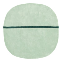 Soft mint green round rug with a contrasting dark teal line pattern across the center.