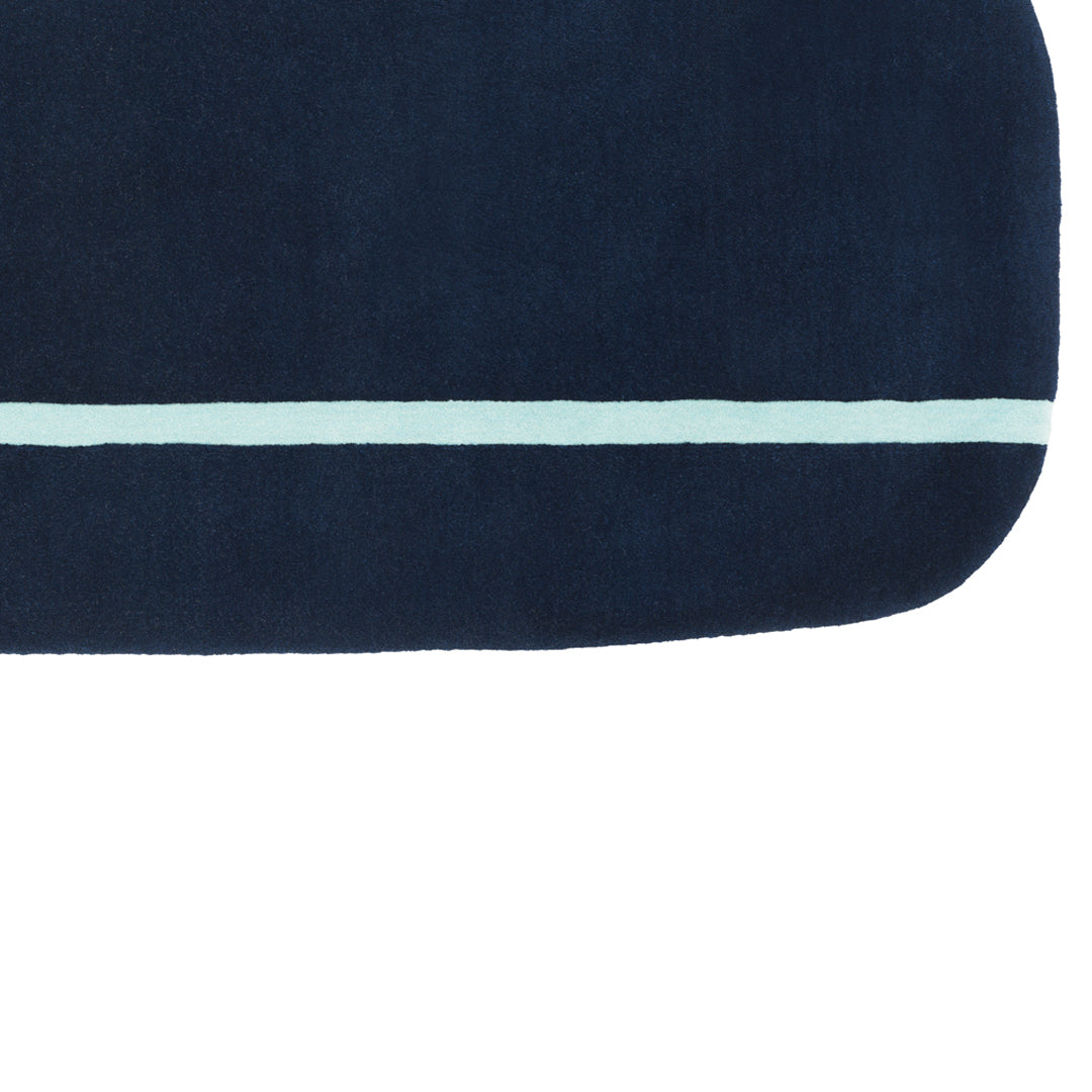 Navy blue fabric with a light blue horizontal stripe across the bottom, featuring a smooth texture.