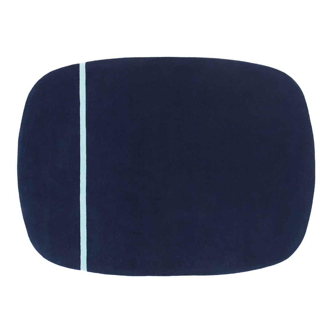 Navy blue rectangular mat with a contrasting light blue stripe. Soft, textured surface for comfort and style.