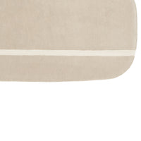 Light beige area rug featuring a simple white horizontal stripe design. Soft texture and neutral tones.