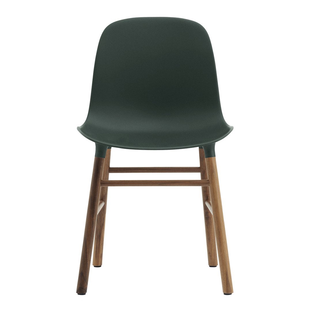 Modern dark green plastic chair with wooden legs, sleek design, perfect for contemporary decor.