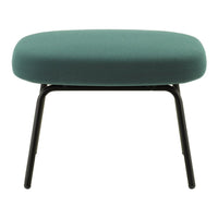 Teal upholstered stool with a smooth, rounded top and sleek black legs, perfect for modern decor.