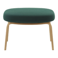 Green upholstered ottoman with a smooth, rounded seat and light wooden legs. Modern, minimalist design.