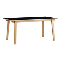 Black tabletop with natural wood legs; sleek modern design ideal for various decor styles.