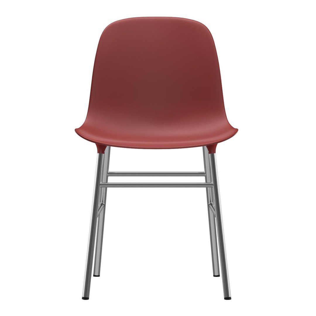 Red chair with a smooth finish and silver metal legs, perfect for modern interiors.