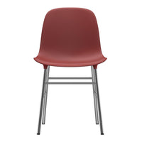 Red chair with a smooth finish and silver metal legs, perfect for modern interiors.
