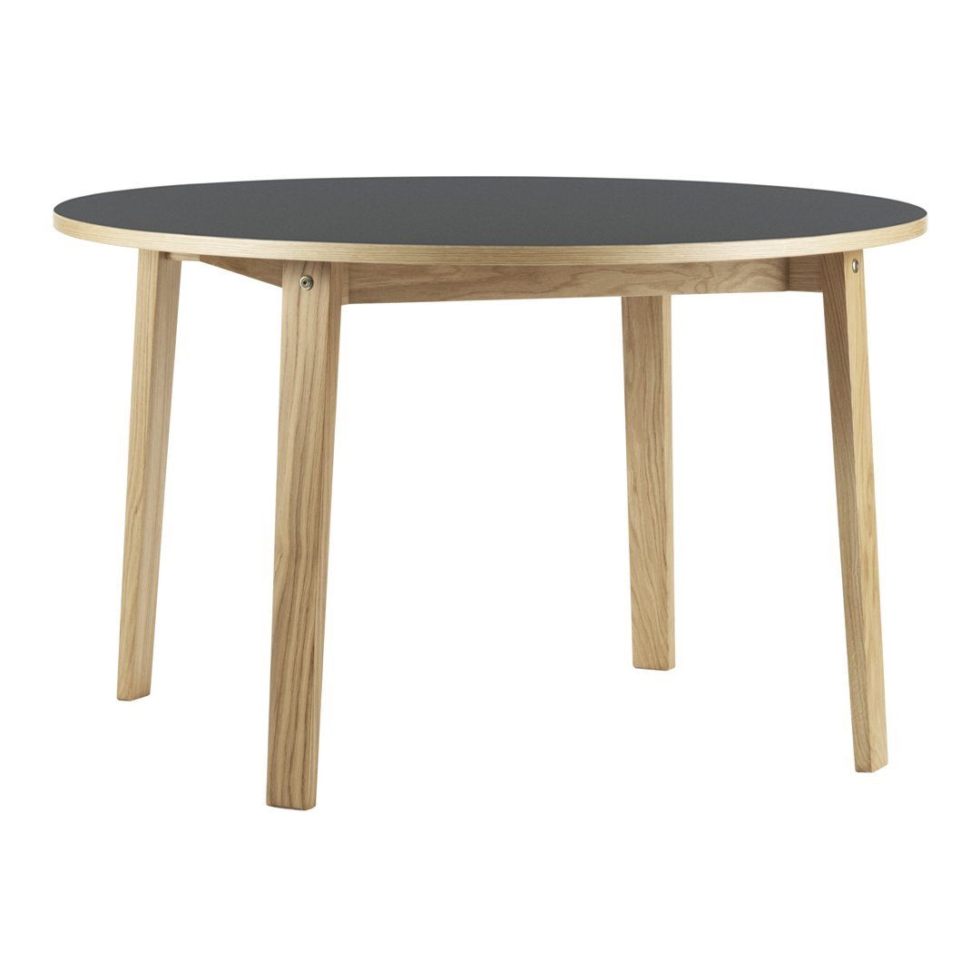 Round table featuring a sleek black top and natural wood legs, ideal for modern or minimalist decor.