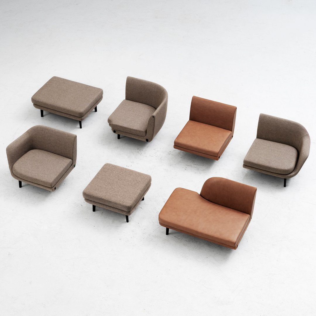 Set of modern lounge chairs in warm beige and rust tones, featuring varied textures and minimalist designs.