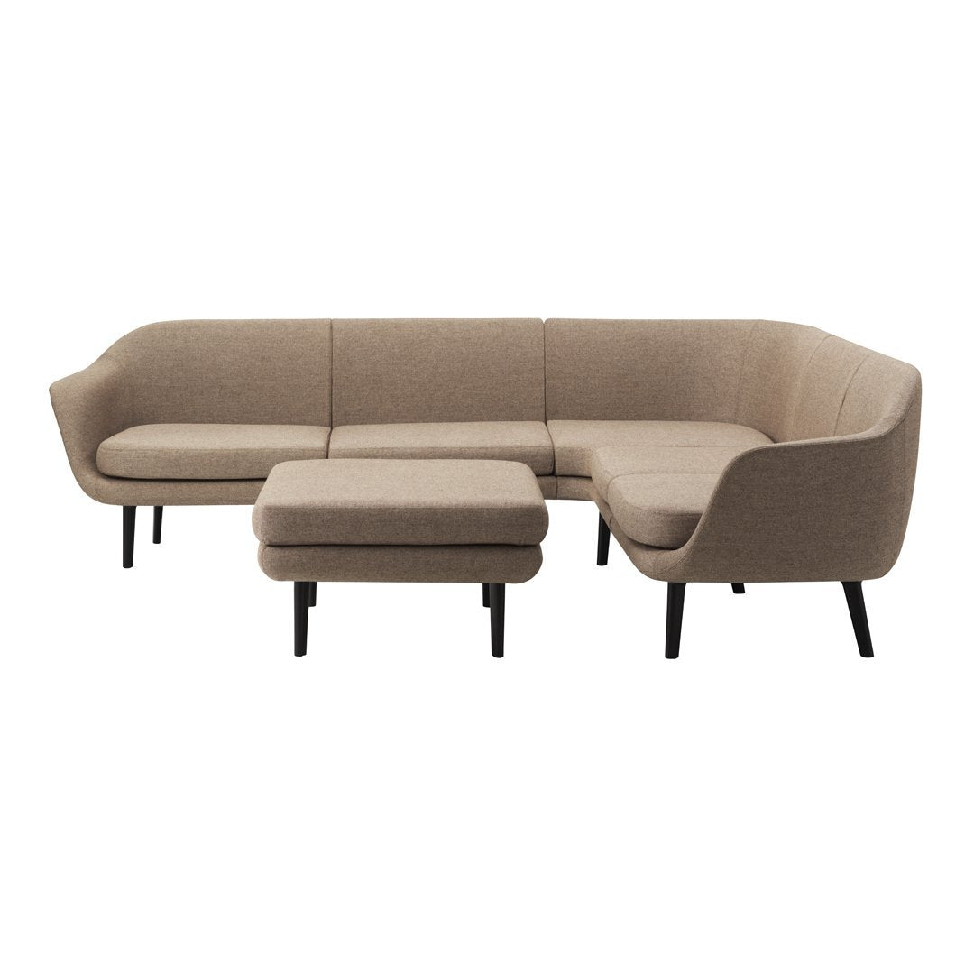 Beige fabric sectional sofa with smooth lines and black tapered legs, featuring a matching fabric ottoman.