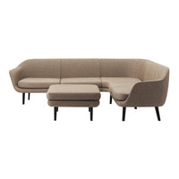 Beige fabric sectional sofa with smooth lines and black tapered legs, featuring a matching fabric ottoman.