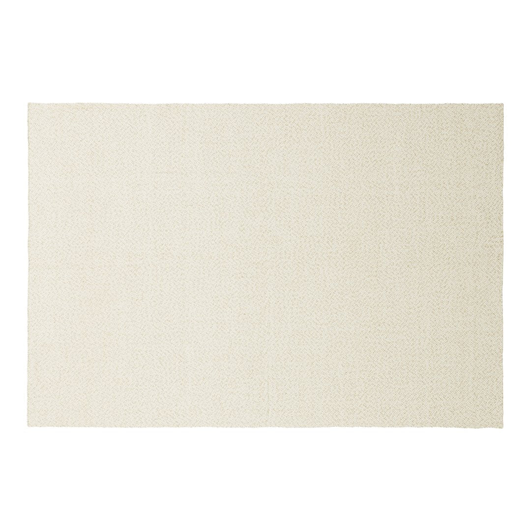 Cream-colored placemat with a subtle textured pattern, perfect for elegant dining settings.