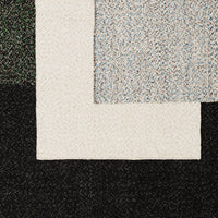 Textured fabric swatches in white, grey, and black with subtle speckles and patterns. Ideal for stylish decor.