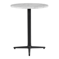 Round marble tabletop in white with gray veining, supported by a sleek black metal base and four-legged design.