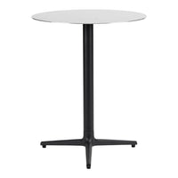 White round tabletop with a sleek black four-legged base, perfect for modern decor.