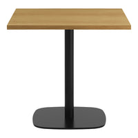 "Light oak tabletop with a sleek black metal base, perfect for modern decor."