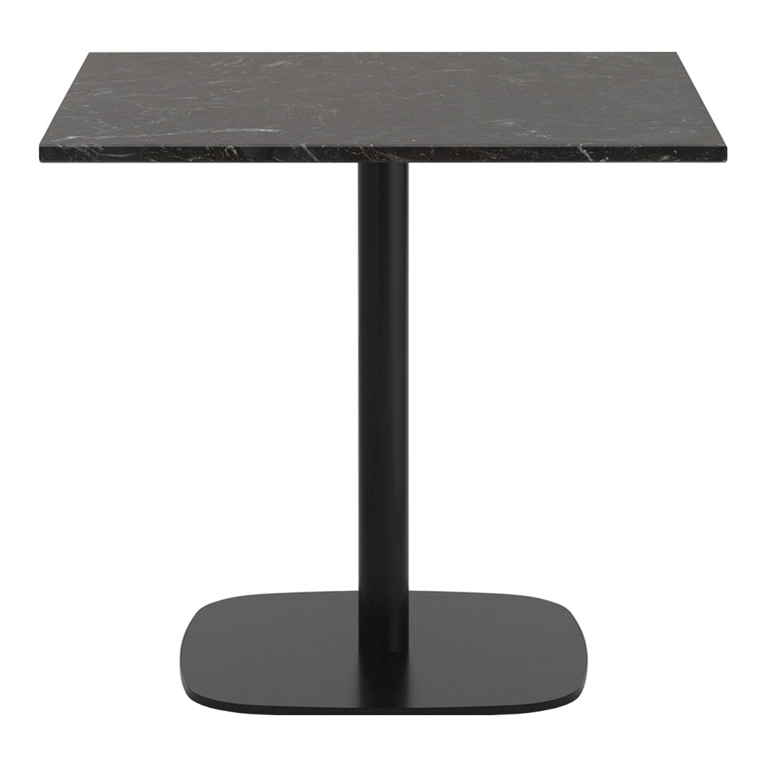 Black marble top dining table with a sleek black metal base, minimalist design and smooth, polished surface.