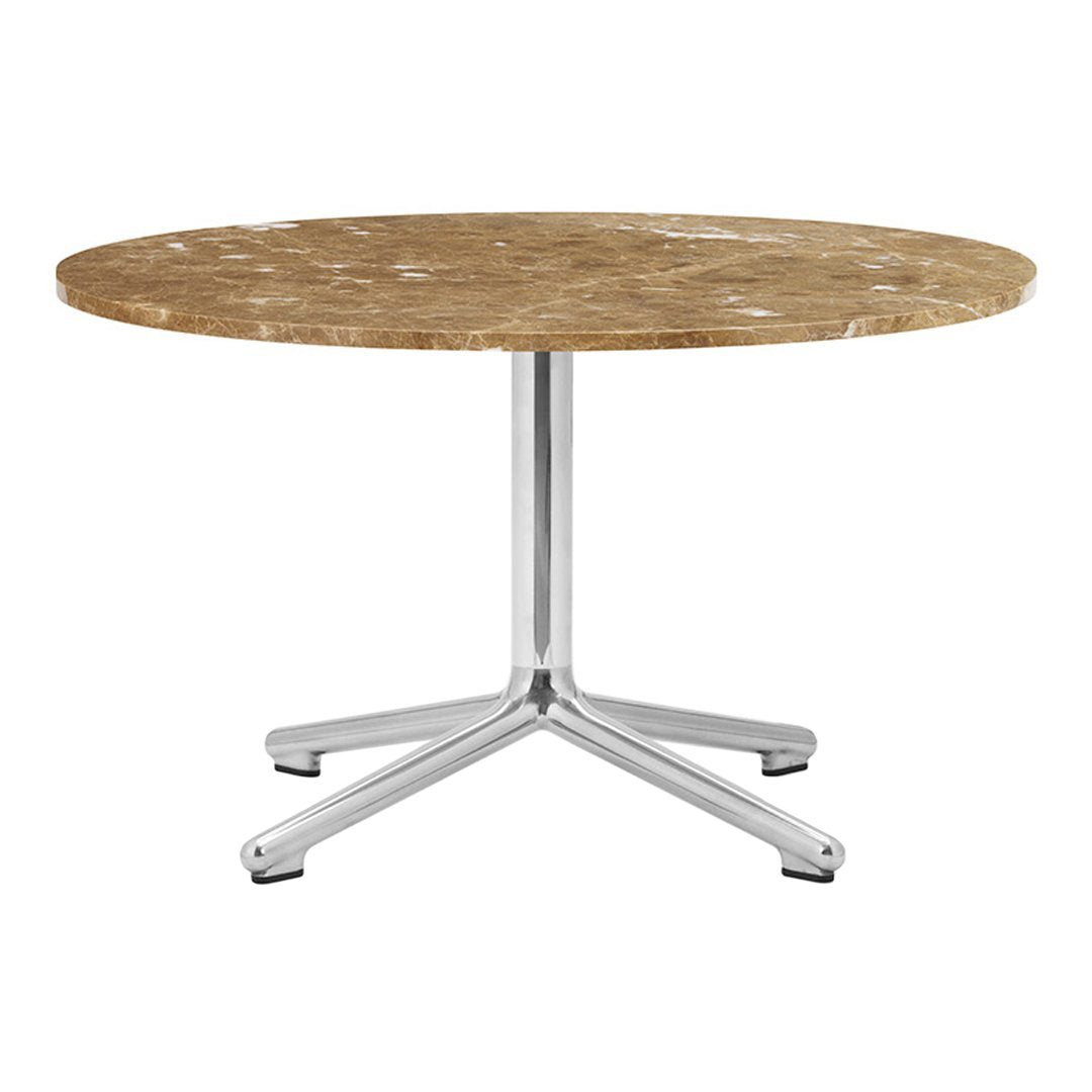 Round table with a natural brown marble top and sleek chrome base, showcasing elegant, modern design.