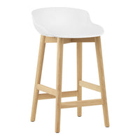 White modern bar stool with a smooth curved seat and natural wood legs. Perfect blend of style and minimalism.