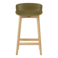 Olive green stool with a smooth seat and natural wooden legs, perfect for modern decor.