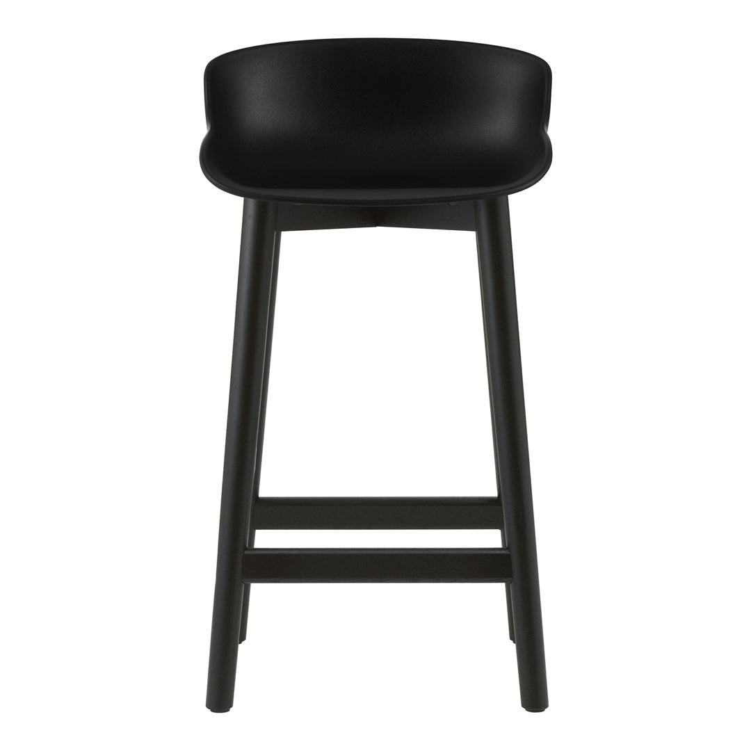 Modern black bar stool with a sleek curved seat and minimalist design, featuring smooth surfaces and clean lines.