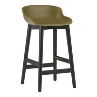Olive green plastic seat bar stool with a sleek black wooden frame, minimalistic design.