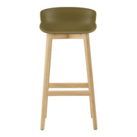 Green plastic bar stool with a minimalist design and natural wood legs. Ideal for modern interiors.