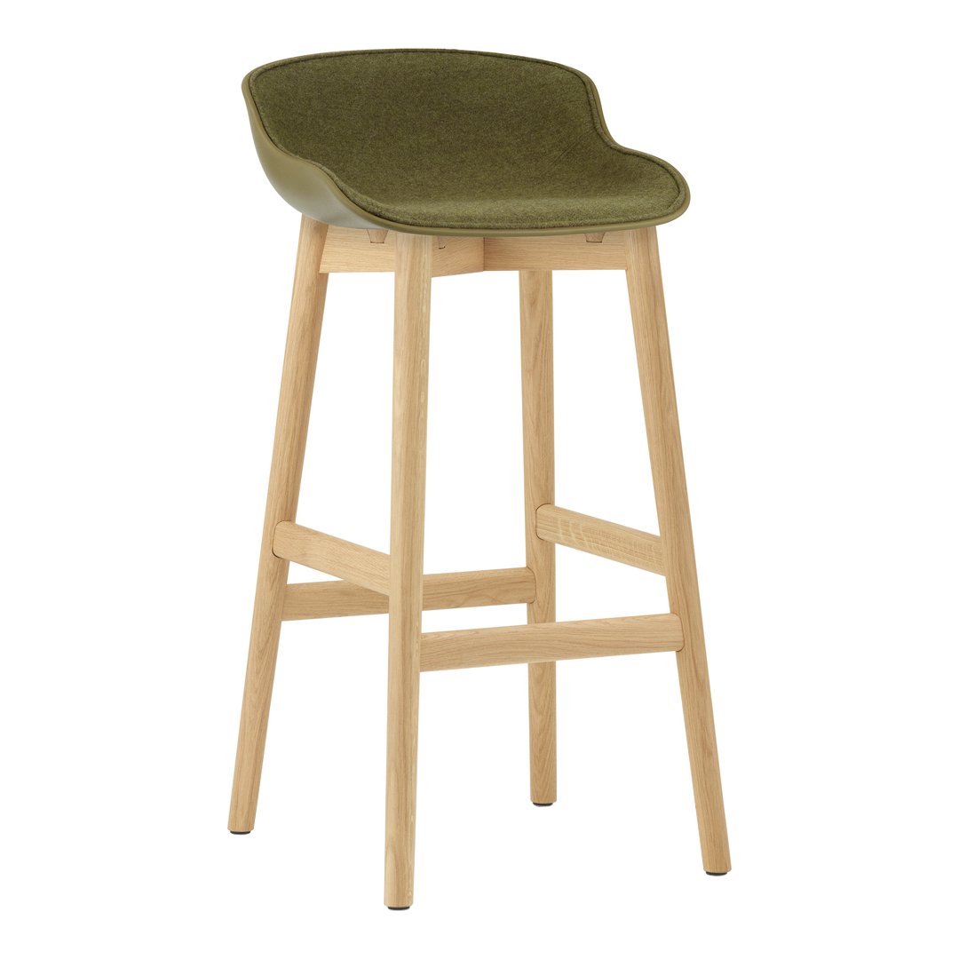Green upholstered bar stool with natural wood legs, featuring a smooth, minimalist design. Perfect for modern decor.