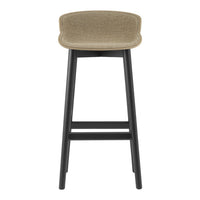 Beige upholstered bar stool with a sleek black wooden frame. Simple, modern design for versatile decor.
