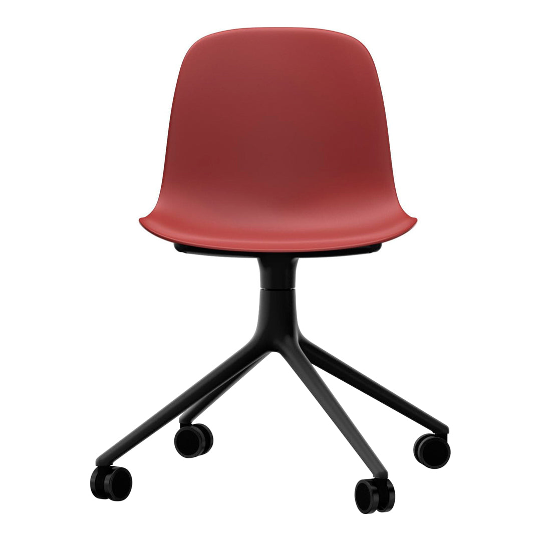 Red molded chair with a black wheeled base, featuring a sleek, modern design suitable for various interiors.