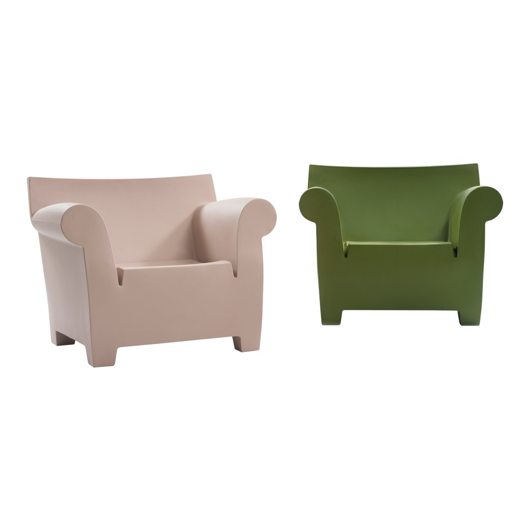 Pair of modern chairs in soft pink and vibrant green, featuring smooth, solid colors with minimalist design.