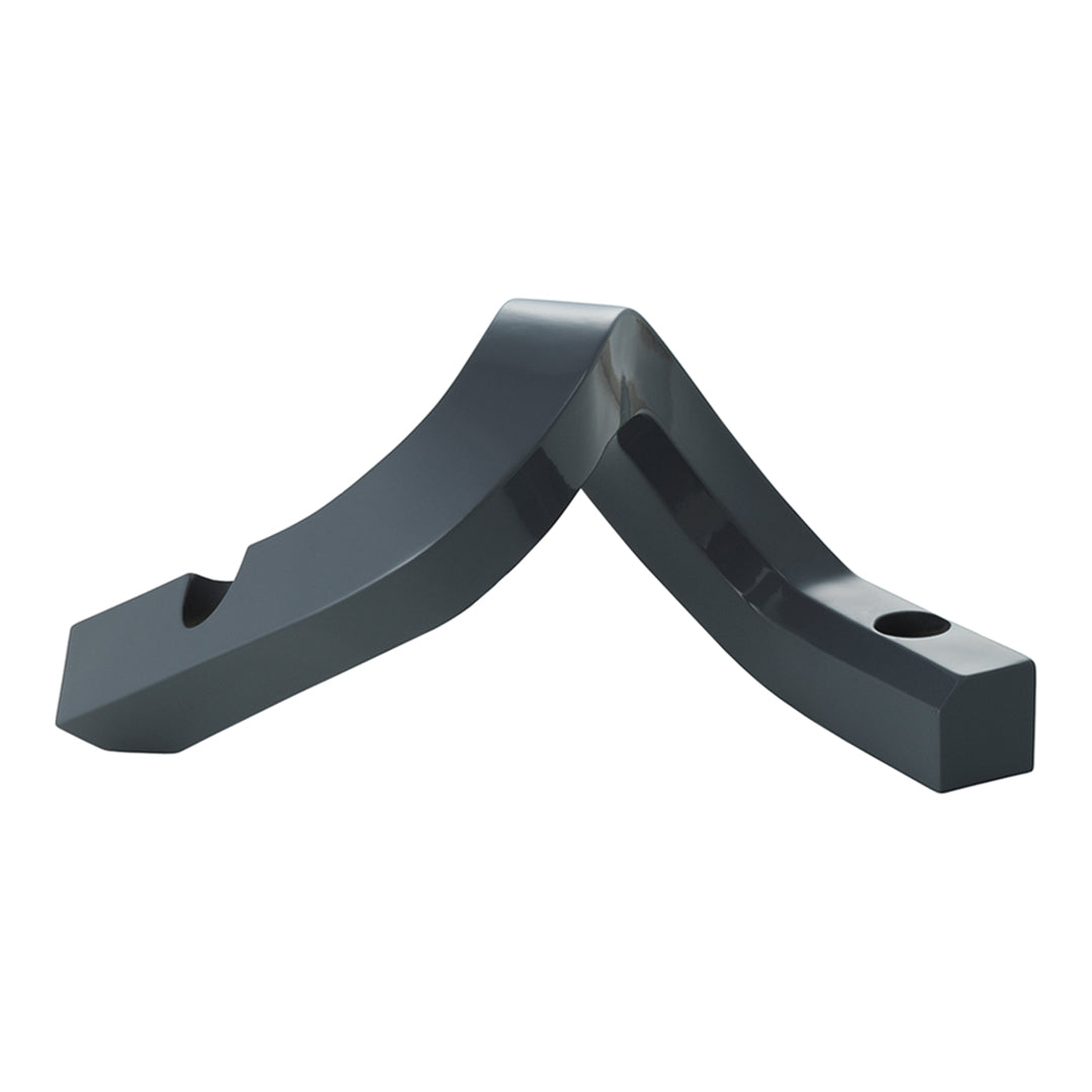 Black geometric tool with a sleek, shiny surface and angles, showcasing a modern design.