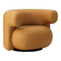 Round swivel chair in warm mustard yellow with smooth, rounded edges and a modern minimalist design.
