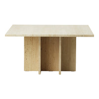 Light beige travertine dining table with smooth surface and minimalist design, featuring a natural textured finish.