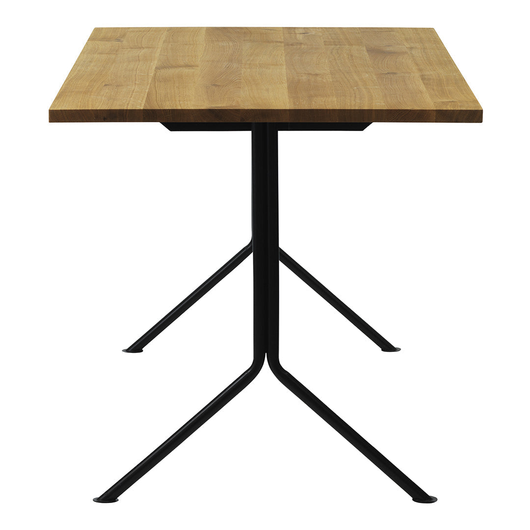 "Square wooden tabletop in natural finish with black metal tripod base, combining rustic and modern elements."