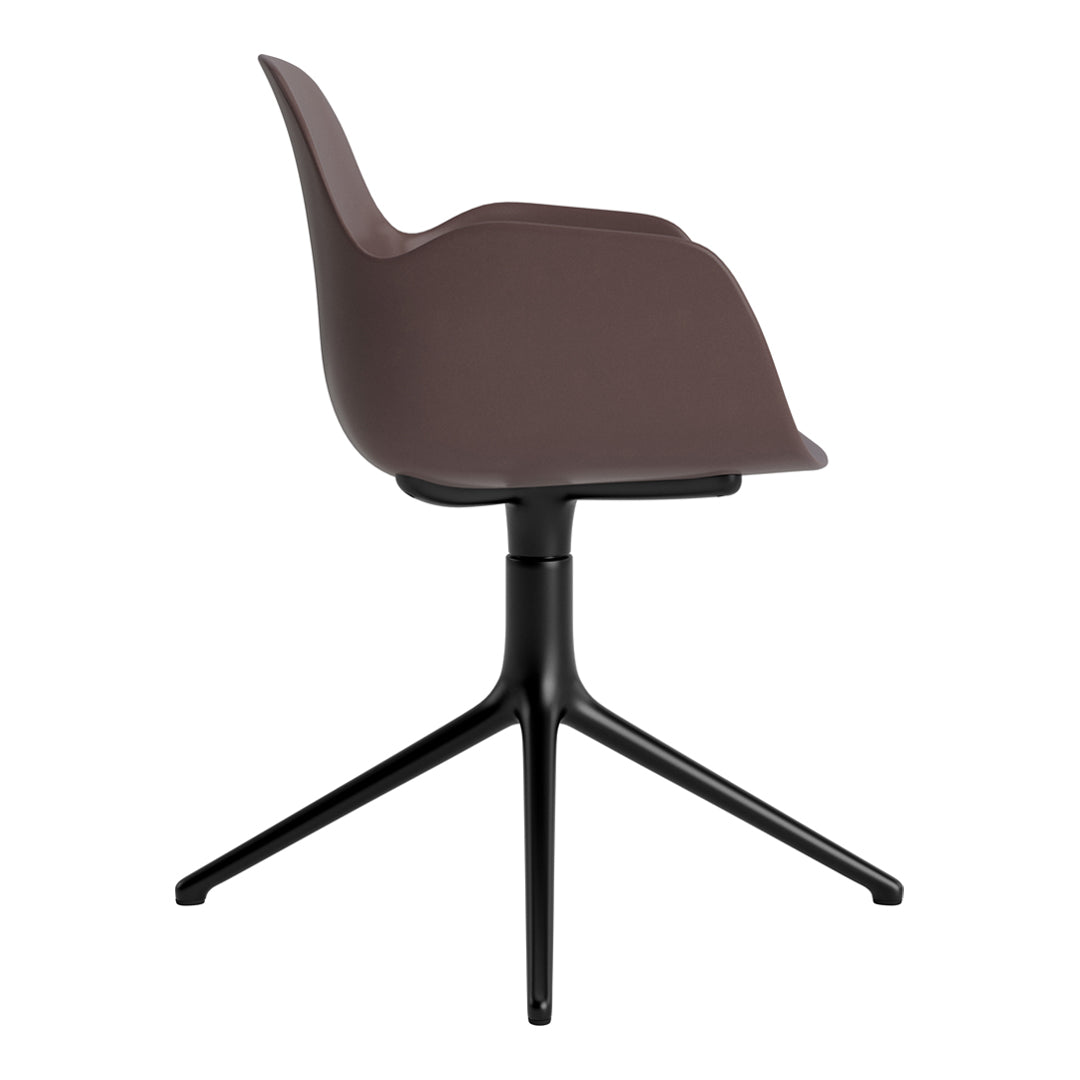 Brown molded chair with sleek lines and a black tripod base, perfect for modern decor. Ideal blend of style and comfort.