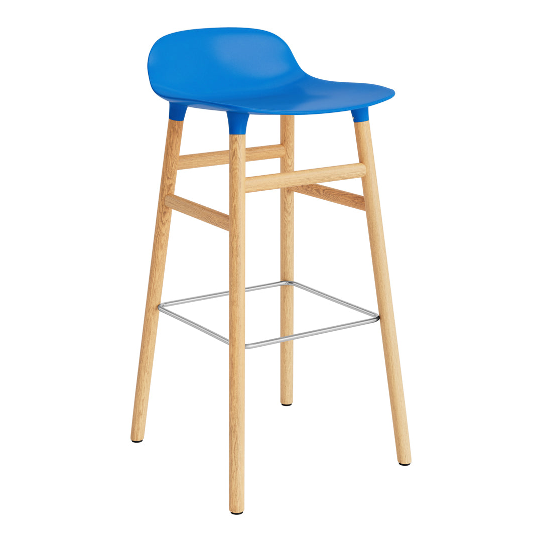 Blue molded seat bar stool with natural wood legs and silver footrest, perfect for modern decor.