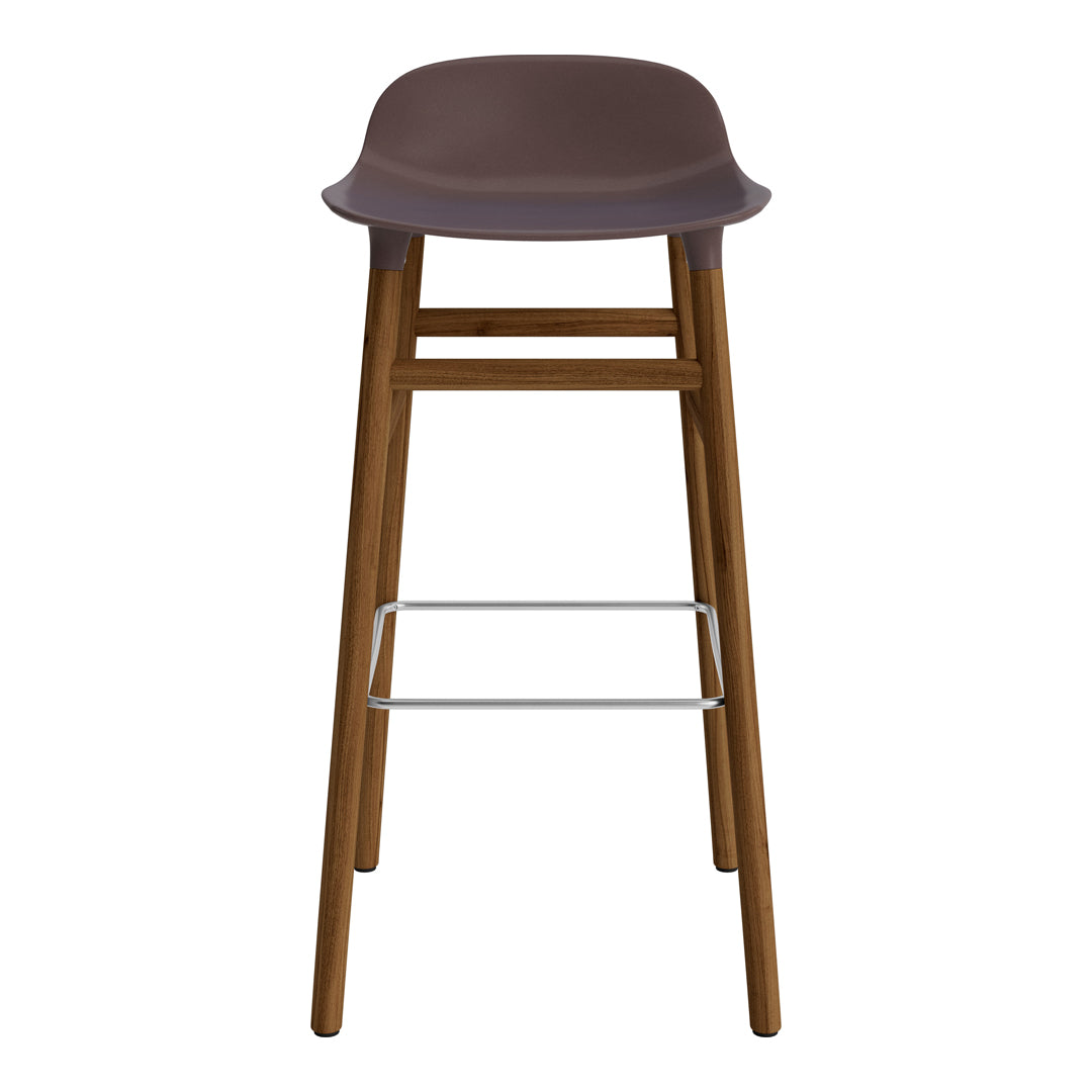 Brown bar stool with a sleek, minimalist design and wooden legs, featuring a smooth, contoured seat.