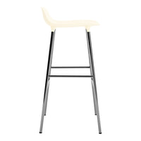 Cream-colored modern bar stool with sleek chrome legs. Simple, contemporary design for stylish interiors.