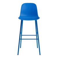 Vibrant blue bar stool with a smooth surface and sleek metal legs, perfect for modern decor.