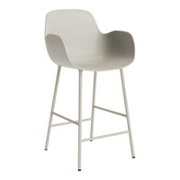 Light gray modern stool with a smooth, curved seat and minimalist metal legs. Perfect for contemporary decor.
